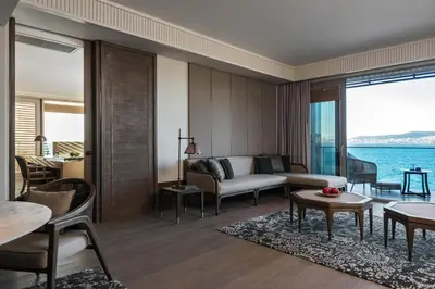 a living room with a couch and a table at Princes' Palace Resort, Buyukada - Member of The Leading Hotels of the World in Adalar