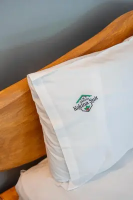 a close up of a white shirt on a bed at Sapanca Kokina Suit in Sakarya