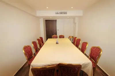 a conference room with a long table and chairs at Pisa Hotel in Istanbul