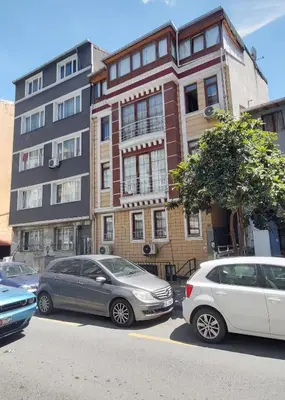 a group of cars parked in front of a building at Hane Apart in Istanbul