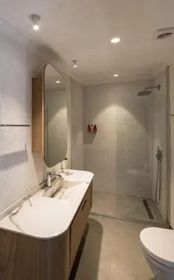 a bathroom with a sink and a shower at The Public Ortakoy in Istanbul