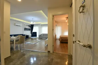 a hallway leading to a living room and a bedroom at Kardeş Suite 5 in Istanbul