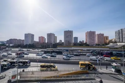 a parking lot with parked cars in a city at Elite Marmara Express Otel in Istanbul