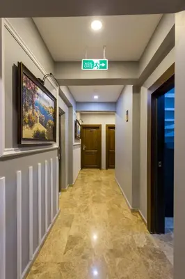a hallway with a sign on the wall of a building at Dream Park Hotel in Istanbul