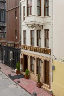 a white building with a sign for a park office at Dream Park Hotel in Istanbul