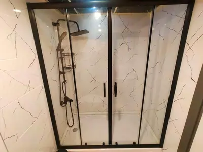 a shower with a glass door in a bathroom at Grand Bona Sera Hotel in Istanbul