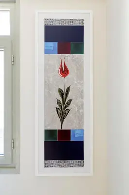 a painting of a flower in a white frame at Nishant Hotel in Istanbul