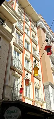 a tall building with balconies and lights in front of it at Konak Apart Hotel in Istanbul