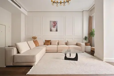 a living room with a couch and a table at Taksim Lagirio Residence in Istanbul