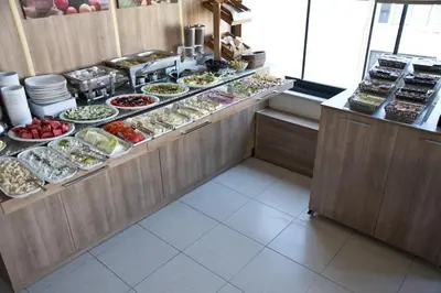 a buffet line with many different types of food at Metrohill Hotel in Istanbul