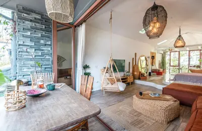 a living room with a table and a couch at Boheme House with Bathtub & Terrace in Istanbul