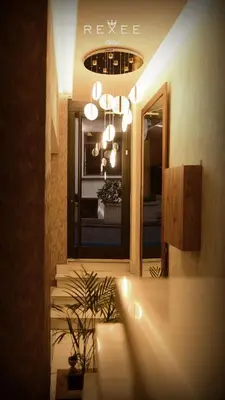 a room with a window and a chandelier at Taksim REXXEE Istanbul Istiklal Hotel in Istanbul