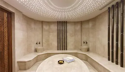 a bathroom with two sinks and a bath tub at Hyatt Regency Istanbul Atakoy in Istanbul