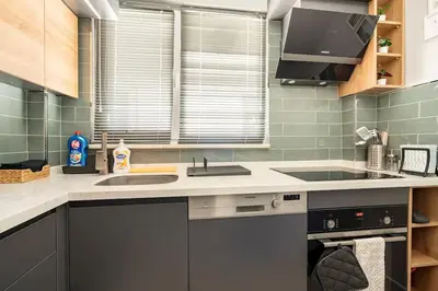 a kitchen with a sink and a stove at Tomtom HOUSE Centre Location in Istanbul