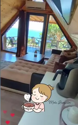 a girl sitting at a table with a bowl of soup at MOLA villas&suites in Marmara