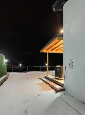 a pavilion on top of a building at night at Eviniz rahatlığında, eşsiz doğa manzaralı dağ evi in Gölcük