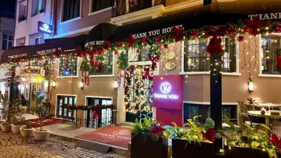 a building decorated with christmas lights and christmas decorations at Thank You Hotel Sultanahmet in Istanbul