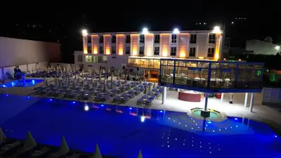 a view of a building with a table and chairs at AQUA MARINN SPA&WELLNESS in Yalova