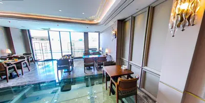 a dining room with tables and chairs in a building at Theodosius Hotel in Istanbul