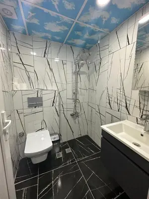 a bathroom with a sink and a toilet at IMMOR AKKUS HOTEL in Istanbul