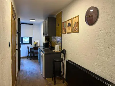 a kitchen with a counter and a bar in a room at Casa Mirasol Terrace Golden Horn Istanbul in Istanbul