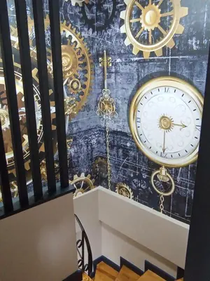 a room with clocks on a blue wall at Bonita Boutique in Istanbul