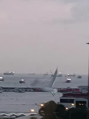 an airplane is taking off from an airport runway at Suite Hotel in Istanbul