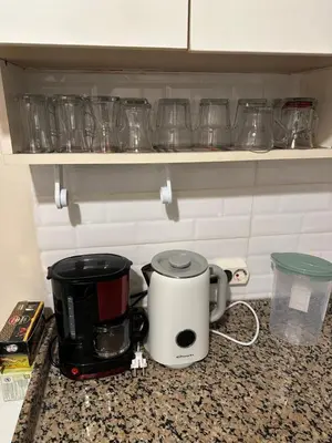 a kitchen counter with a coffee maker and a toaster at Sea view House in Istanbul