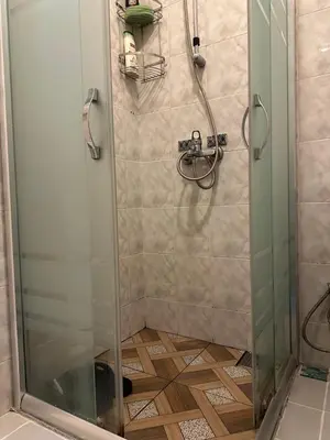 a shower with a glass door in a bathroom at Sea view House in Istanbul