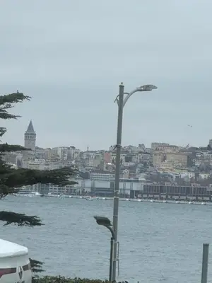 a street light next to a body of water at Sea view House in Istanbul