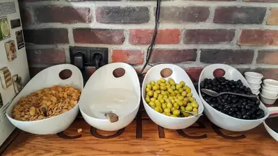a group of bowls filled with different types of food at Sirkeci Esen Apart in Istanbul