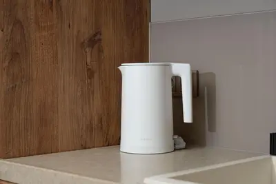 a white pitcher sitting on top of a counter at Tare Houses in Istanbul