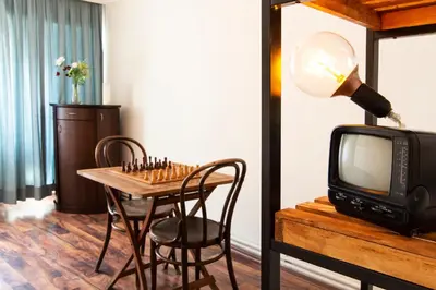a room with a table and a small television at An Unforgettable Experience in Istanbul