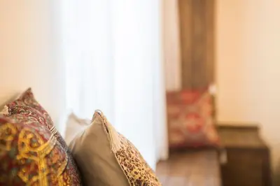 a group of pillows sitting on top of a couch at Beautiful 1 Br Apt. w/AC 400 meters Taksim Square in Istanbul
