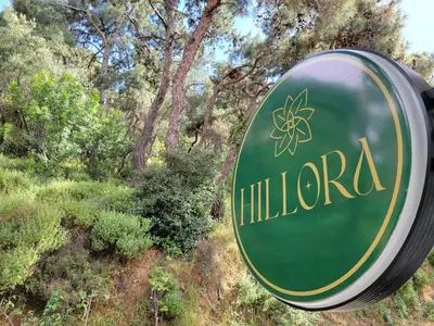a sign for a hilagon gas station at Hillora Hotel Buyukada in Adalar