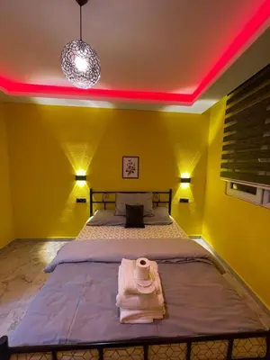a bedroom with a bed with a towel on it at Taksim academie house in Istanbul