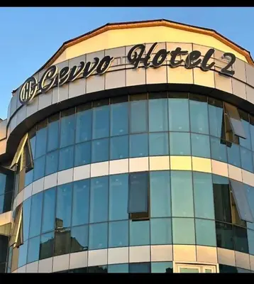 a building with a sign on the top of it at Cevvo Hotel Pendik in Istanbul