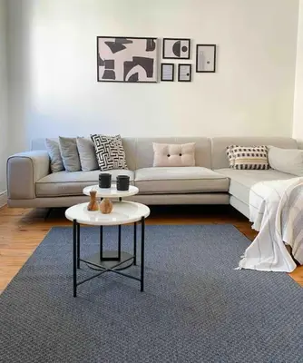a living room with a couch and a table at Charming historical apartment in Galata in Istanbul
