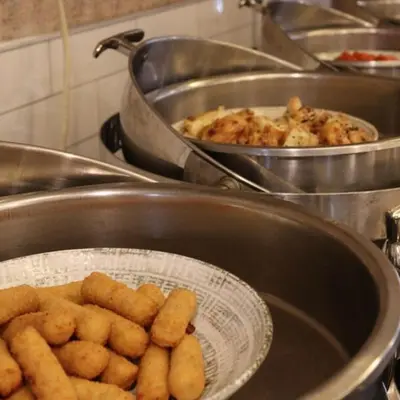 a bunch of food in a pot on a stove at Gzh Park Bosphorus in Istanbul
