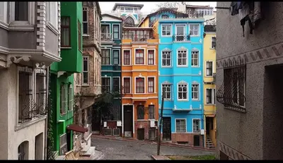 a group of colorful buildings in a city at Fatih Balatta Pink Home 3 in Istanbul