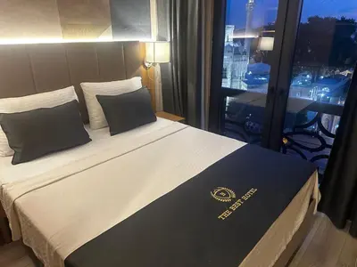 a bed with two pillows in a hotel room at The Best Hotel İstanbul in Istanbul