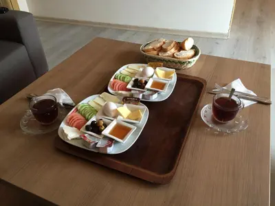a table with two plates of food on a table at Sun Suites in Istanbul