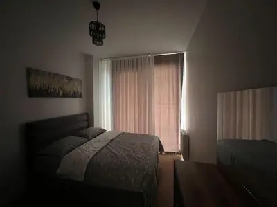 a bedroom with a bed and a window at Cozy Homes 2 Room Apartment Well Designed in Esenyurt