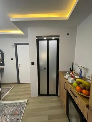 a kitchen with a counter with fruit on it at Le Valeria Deluxe in Istanbul