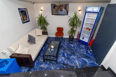 a living room with a blue tiled floor at Wond House in Istanbul