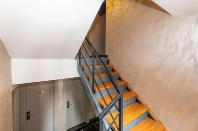 a staircase leading to the second floor of a house at Massimo Hotel in Istanbul