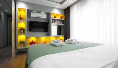 a bedroom with a bed with towels on it at Sea Sparkle in Istanbul
