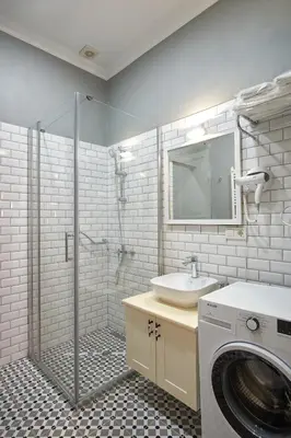 a bathroom with a sink and a washing machine at Nostalgic & Comfortable Historical Home! in Istanbul