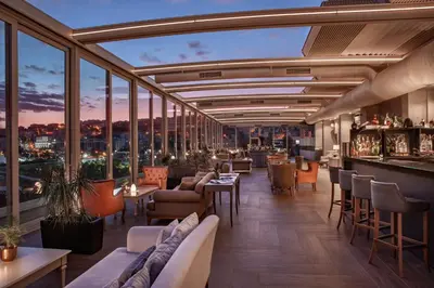 a restaurant with a view of a city at Lazzoni Hotel in Istanbul