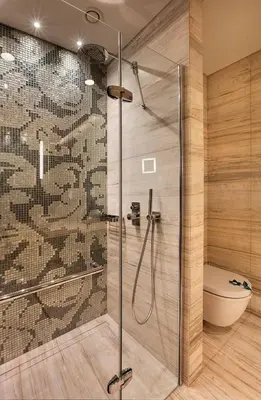 a bathroom with a glass shower with a toilet at Fer Hotel in Istanbul